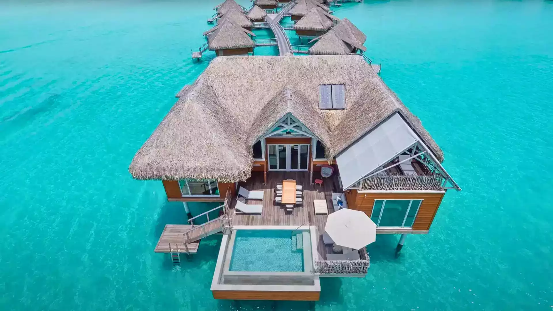 French Polynesia honeymoon couple overwater bungalow