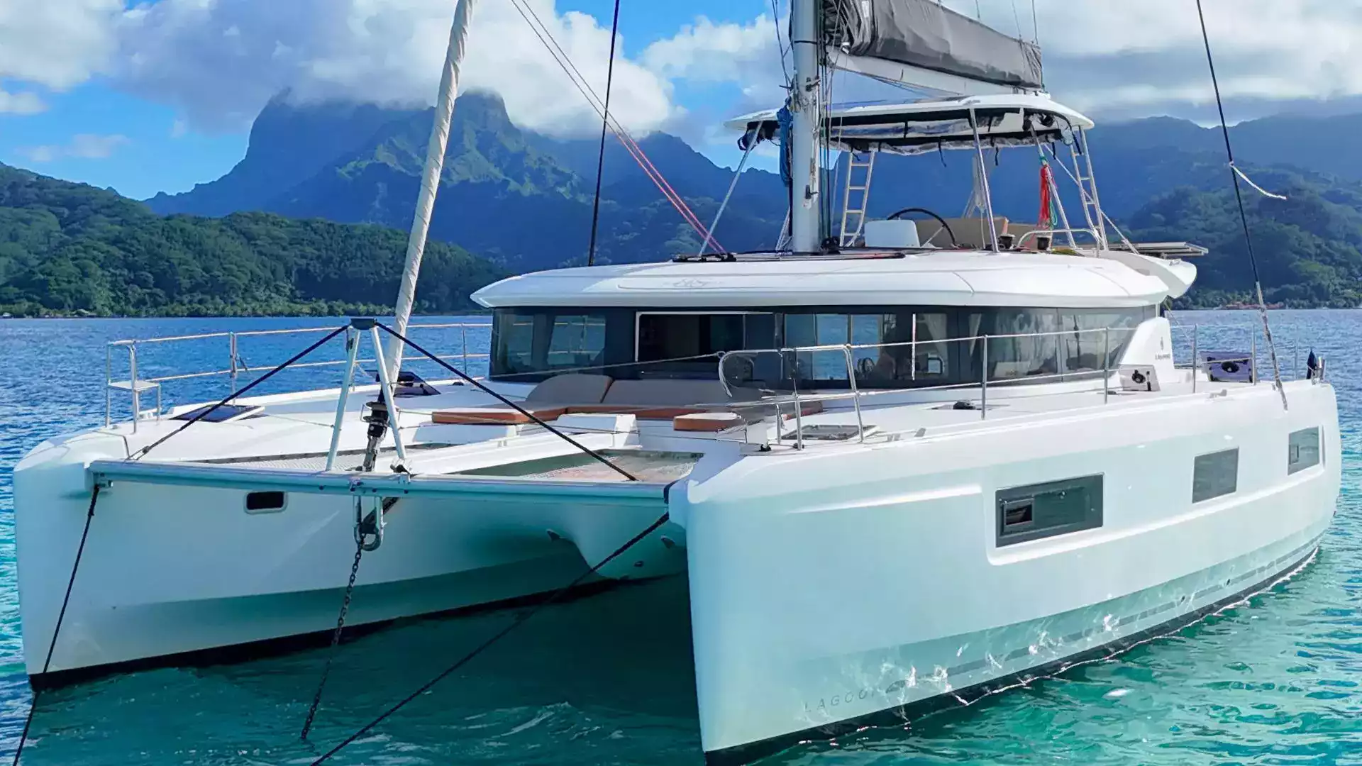 Catamaran sailing between Raiatea and Taha'a, French Polynesia