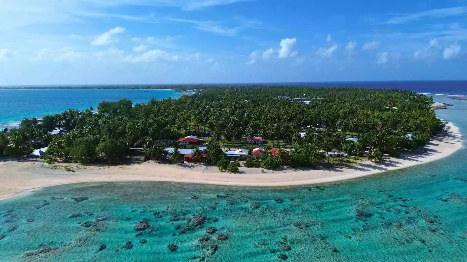 Tuamotu atoll lagoon turquoise French Polynesia honeymoon